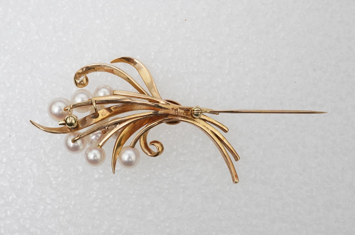 Mikimoto, a cultured pearl brooch